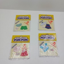 Poupée peter polly Pom Pom lot de 4 tenues neuves sous blister 