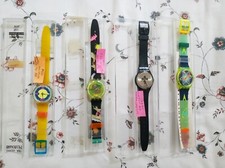 1.  LOT 4 BELLES SWATCH.OCCASION. GB 126, GJ 107, GK 130 et GK133 jamais portées