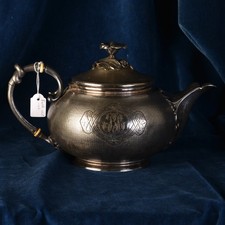 Théière en métal argenté