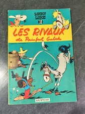 LUCKY LUKE n.18 Les rivaux se Painful Gulch  1964 dos Jaune TTBE  1e Red 