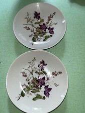 2 anciennes sous tasses à