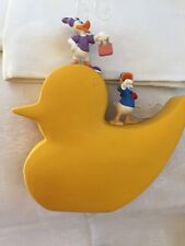 Tirelire ancienne vintage en résine Donald et Daisy