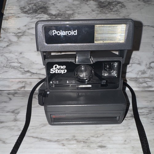 Polaroid 600 one - step, instant