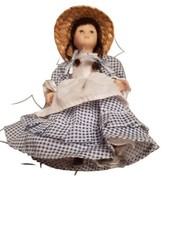 Poupée de collection en porcelaine 15 cm. très bon état cheveux bruns nattés