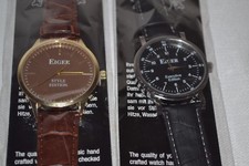 2 MONTRES MARQUE EIGER EXECUTIVE EDITION  HOMME MARRON  ET NOIRE