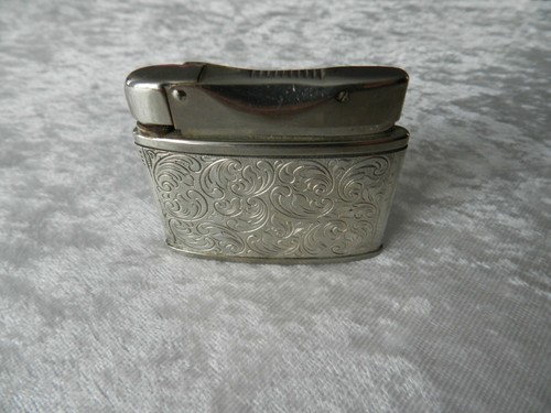 Rare ancien briquet essence - à,