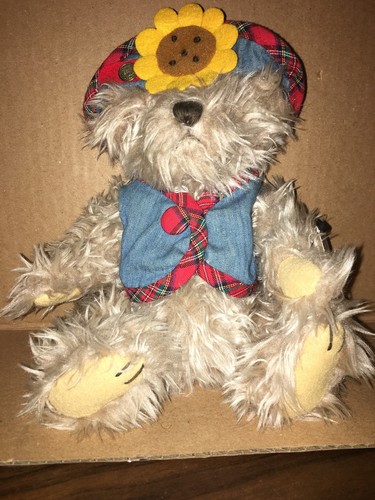 The brass button bear - button,