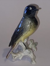 Figurine Oiseau Rouge Queue en porcelaine signée Karl Ens