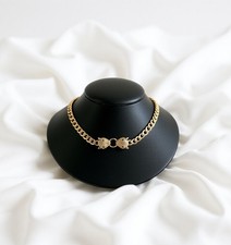 Collier double tête de