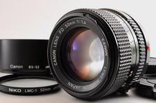Objectif standard Canon NFD 50mm F1.4 neuf FD MF avec capot BS-52 PRESQUE...