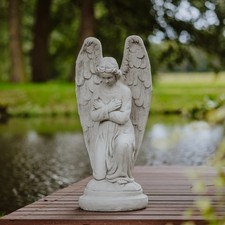 Statue ange sur socle rond