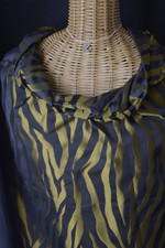 Dries van Noten. Sublime jacquard avec soie. Motif tachiste noir bronze/curry