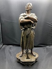 statue regule arabe maure avec un moukala