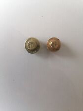 2 poids en laiton cylindriques