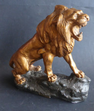 lion h 31cm par   T Cartier - medaille d'or au salon en platre