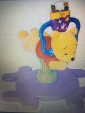 GROS JOUET  1er ÂGE DISNEY  WINNIE TOURNI REBOND SONORE ET LUMINEUX