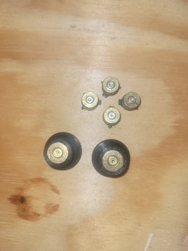 Custom shell casing buttons