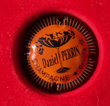 capsule champagne PERRIN daniel n°43 orange contour bleu striée