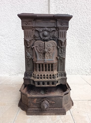 Ancien poêle bois ou - à,