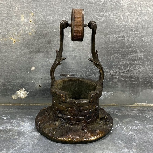 Pyrogène puit bronze - en,