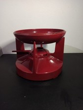 Ancien appareil à fondu ou chauffe plat Castiron France en fonte couleur rouge