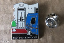 Pin's publicité  EDF GDF
