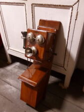 Téléphone ancien, mural de la marque Bell . Bois bakélite . Fin XIXe.Début XXe