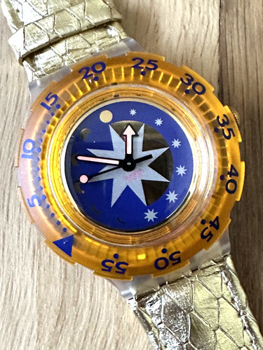 Swatch golden island sdk112 - "golden,