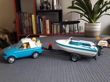 PLAYMOBIL - Pickup décapotable, remorque à treuil, bateau et quatre personnages