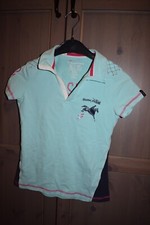 Polo équitation à manches courtes marque décathlon fouganza turquoise 12 ans