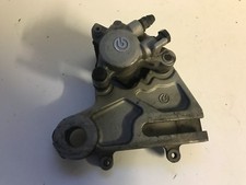 UN ETRIER DE FREIN ARRIERE