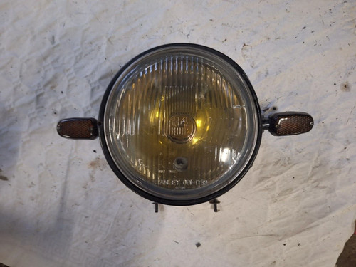 Phare avec araignee honda 450 - phare,