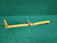 ANCIEN OUTIL DE MESURE PIED DE