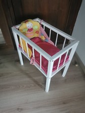 Lit haut de poupée en bois blanc