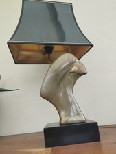 Lampe Orné D'une Tête En Laiton. Maison Charles