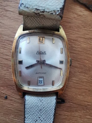 Montre ancienne fedex antichoc - montre,