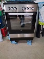 gazinière électrique et gaz de ville ou butane à chaleur tournante  BEKO