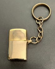 REF T1 -  Porte-clés BRIQUET