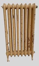 Radiateur ancien sur pieds a lames fleuries en fonte de fer XX siècle