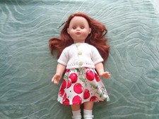 vetements de poupées