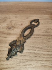Ancien décapsuleur en bronze