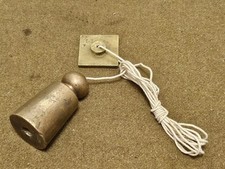 Ancien fil à plomb laiton