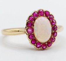 Bague marguerite antique or 18k cabochon opale 0,44 carats et rubis (circa 1900)