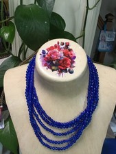 collier  de pierres bruts,saphirs bleus310 carats