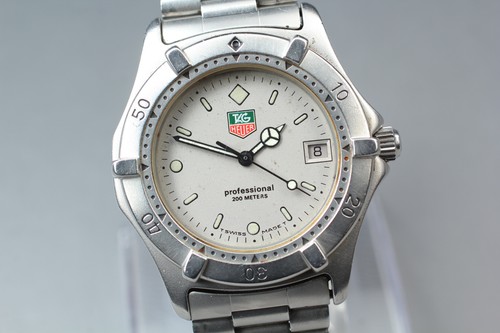 Comme neuf tag - tag, heuer