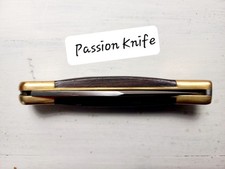 Couteau Buck 110 Palissandre des Indes "Sublime son manche"