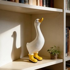 Statue canard résine jaune