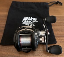 Moulinet Abu Garcia Revo Elite 8 noir avec sac de rangement