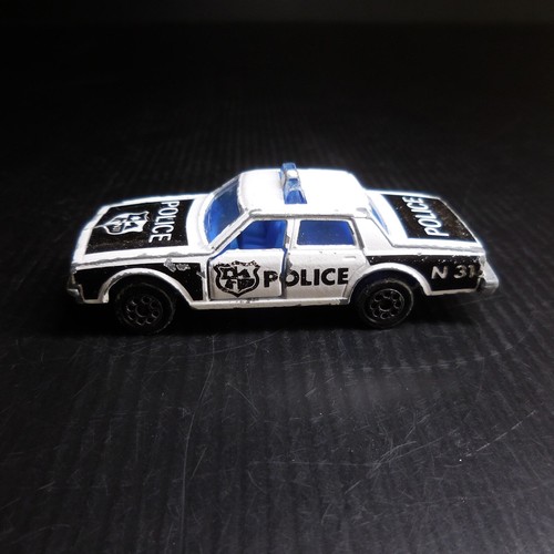 Voiture miniature police noir