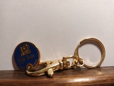 porte clé jeton caddie leffe